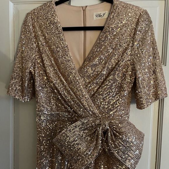 Stunning Eliza J ankle length gold sequined dress.